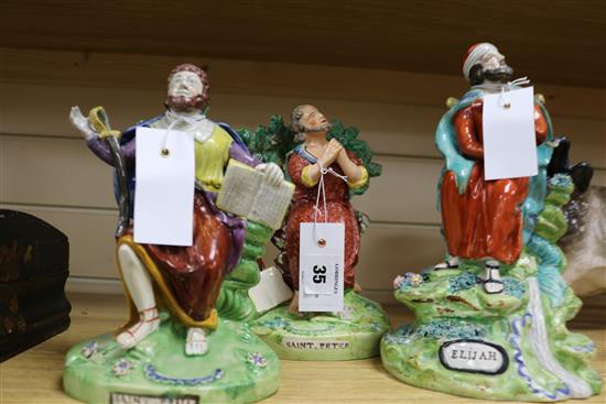 Three Staffordshire Pearlware figures of religious men, early 19th century, 20.5 - 25.5cm, some restoration